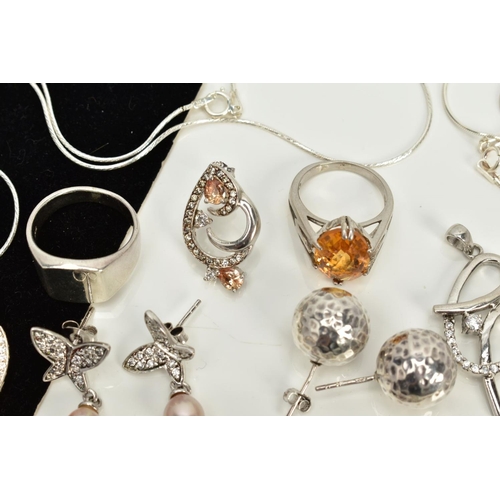 15 - A COLLECTION OF WHITE METAL ASSORTED JEWELLERY ITEMS to include an orange crystal and cubic zirconia... 