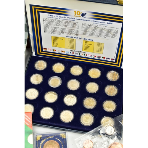 150 - SIX WOODEN CASES HOUSING TWELVE COMMEMORATIVE SETS OF EURO COINS each with different dates to includ... 