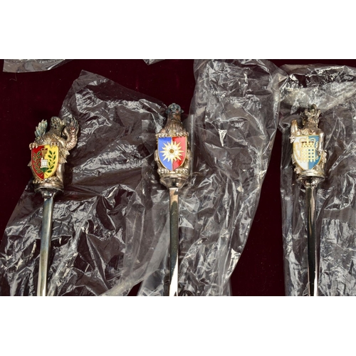 156 - A CASED SET OF TEN COMMEMORATIVE 'QUEENS BEASTS' SPOONS, case number 1384 of 2500, each silver and e... 