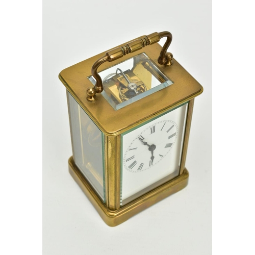 157 - A SMALL CARRIAGE CLOCK, within an open glass/brass case, white dial, Roman numerals, black hands, to... 