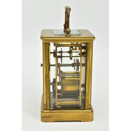 157 - A SMALL CARRIAGE CLOCK, within an open glass/brass case, white dial, Roman numerals, black hands, to... 