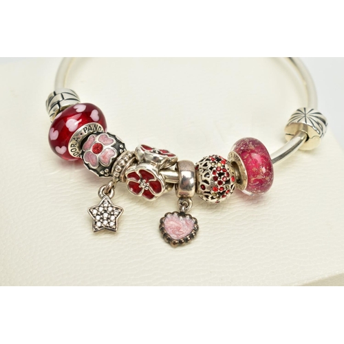 160 - A MODERN PANDORA BANGLE, together with assorted charms, enamelled, glass floral designs in predomina... 