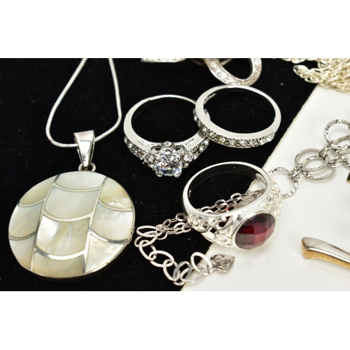 17 - A COLLECTION OF WHITE METAL ASSORTED JEWELLERY ITEMS, to include a mother of pearl pendant, a cubix ... 