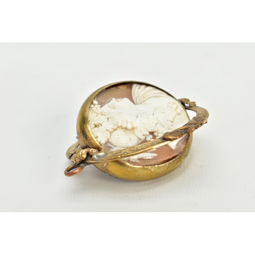 170 - A YELLOW METAL SWIVEL MEMORIAL CAMEO PENDANT, the oval cameo panel depicting a lady in profile withi... 