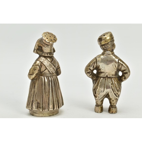 189 - A PAIR OF EARLY 20TH CENTURY CONTINENTAL WHITEL METAL NOVELTY PEPPERETTES, in the form of a Dutch ma... 