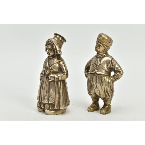 189 - A PAIR OF EARLY 20TH CENTURY CONTINENTAL WHITEL METAL NOVELTY PEPPERETTES, in the form of a Dutch ma... 