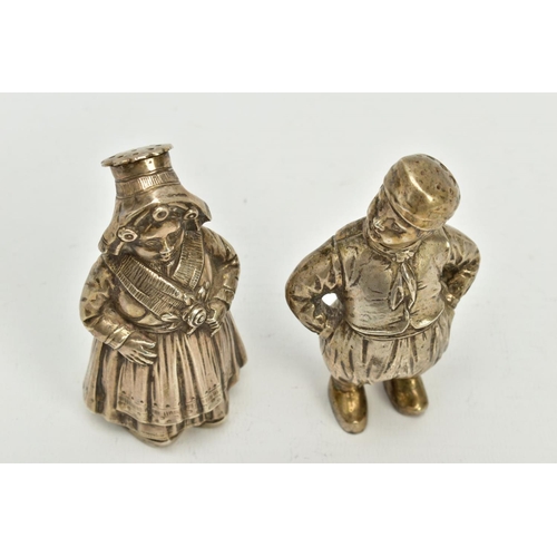 189 - A PAIR OF EARLY 20TH CENTURY CONTINENTAL WHITEL METAL NOVELTY PEPPERETTES, in the form of a Dutch ma... 