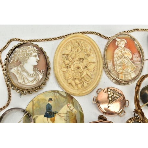 201 - A SELECTION OF ITEMS, to include two gold plated cameo panels one depicting a lady in profile within... 