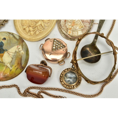 201 - A SELECTION OF ITEMS, to include two gold plated cameo panels one depicting a lady in profile within... 