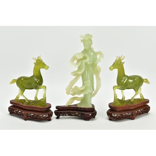 205 - THREE CARVED GREEN HARDSTONE FIGURES AND BOXES, to include a carved oriental figure of a lady, with ... 