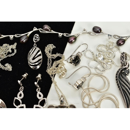 28 - A COLLECTION OF WHITE METAL ASSORTED JEWELLERY ITEMS, to include a black freshwater pearl and cubic ... 