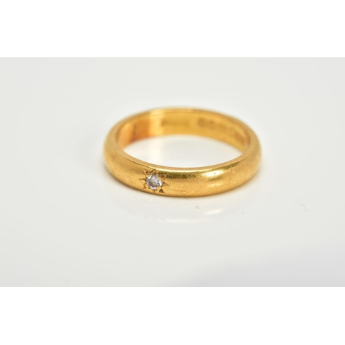 29 - A MID TO LATE CENTURY 22CT GOLD DIAMOND WEDDING BAND, measuring approximately 3.6mm in width, ring s... 