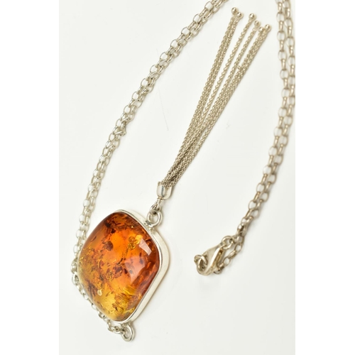 33 - A CASED WHITE METAL AMBER PENDANT NECKLACE, the fitted pendant of square form, set with a square cab... 