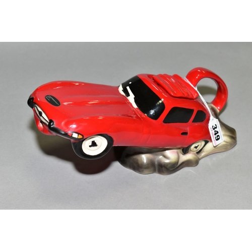 349 - A COOPERCRAFT RED E-TYPE JAGUAR COLLECTOR'S TEA POT, moulded with the front end lifted off the groun... 