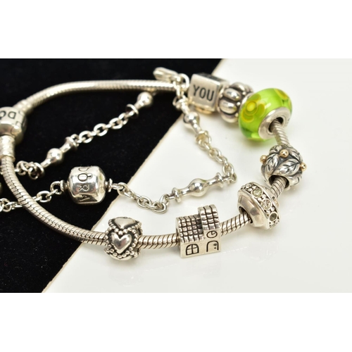 35 - A PANDORA CHARM BRACELET WITH CHARMS AND ONE OTHER, the snake chain bracelet fitted with seven charm... 