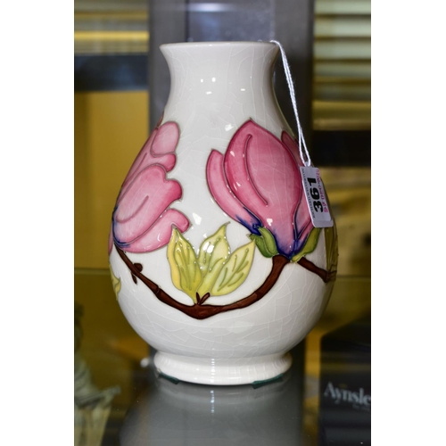 361 - A MOORCROFT POTTERY VASE, 'Magnolia' pattern on white ground, impressed backstamp and WM to base, he... 