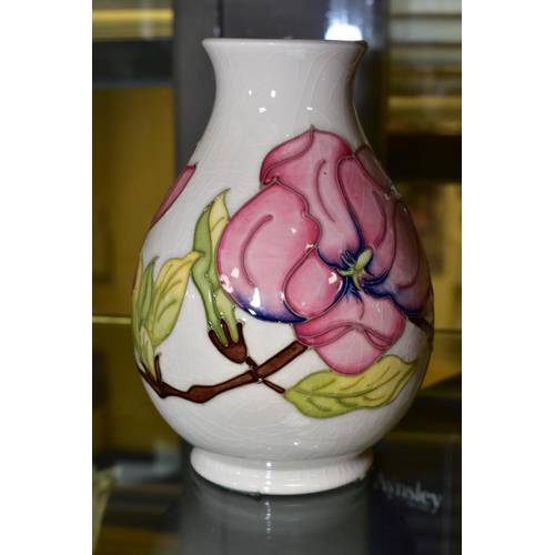 361 - A MOORCROFT POTTERY VASE, 'Magnolia' pattern on white ground, impressed backstamp and WM to base, he... 