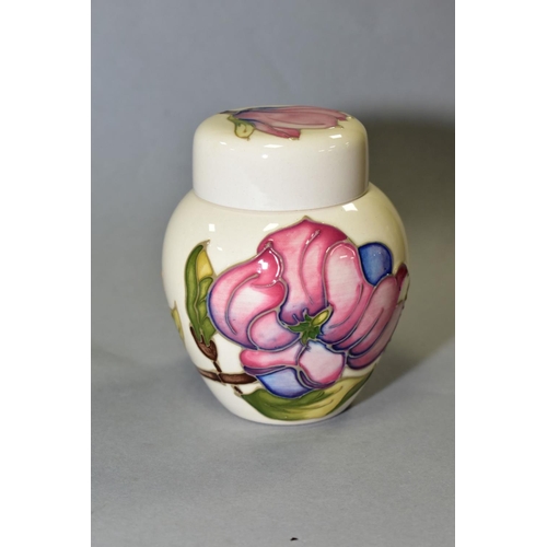 364 - A SMALL MOORCROFT POTTERY GINGER JAR, 'Magnolia pattern' on cream ground, impressed back stamp, heig... 