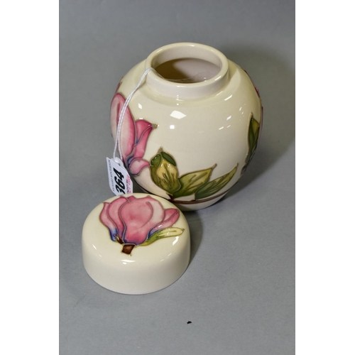 364 - A SMALL MOORCROFT POTTERY GINGER JAR, 'Magnolia pattern' on cream ground, impressed back stamp, heig... 