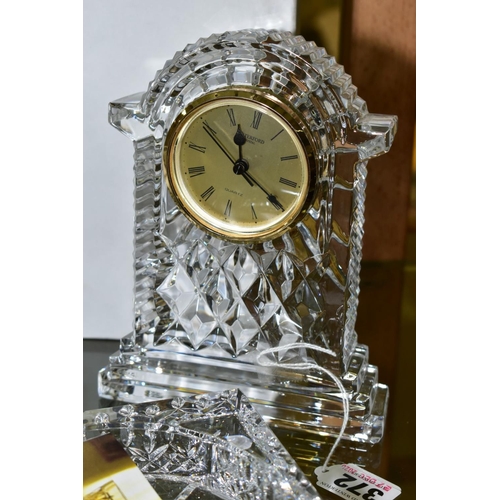 372 - A BOXED WATERFORD CRYSTAL 'GOLD FACED CARRIAGE CLOCK', stamped to base, height 18cm (slight chips to... 