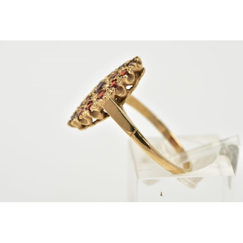 38 - A 9CT GOLD GARNET RING, of a lozenge design set with fifteen circular cut garnets, plain polished ba... 