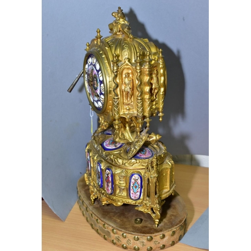 383 - A LATE 19TH CENTURY FRENCH GILT METAL AND PORCELAIN LEROY & FILS MANTEL CLOCK, the finial with two r... 