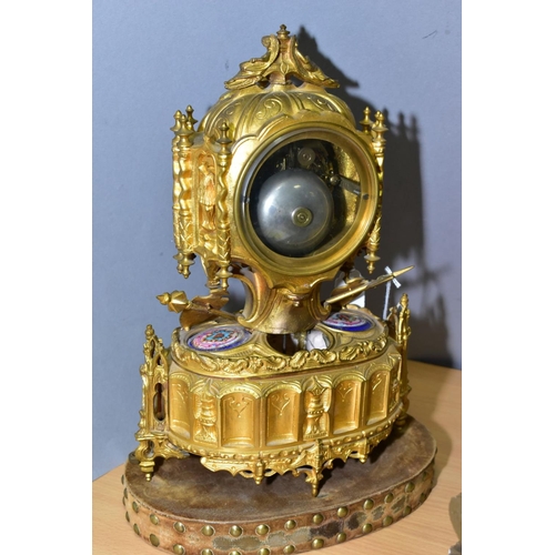 383 - A LATE 19TH CENTURY FRENCH GILT METAL AND PORCELAIN LEROY & FILS MANTEL CLOCK, the finial with two r... 