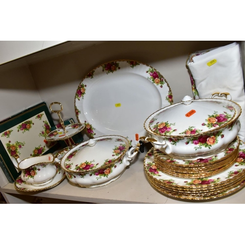 393 - A ROYAL ALBERT OLD COUNTRY ROSES DINNER SERVICE, comprising an oval 41.5cm meat plate, two twin hand... 