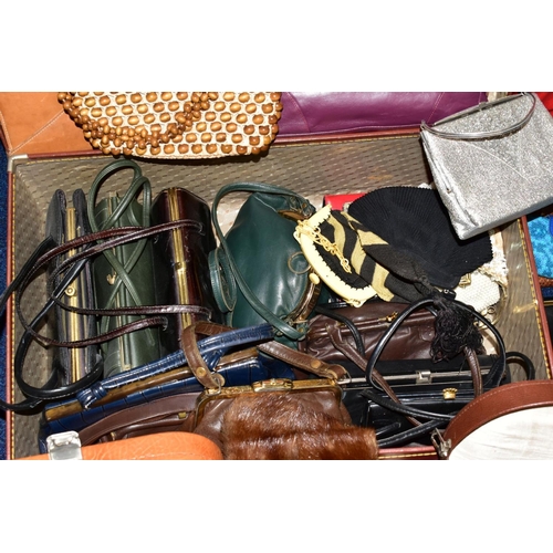 435 - TWO SUITCASES AND TWO VANITY CASES CONTAINING HANDBAGS, PURSES ETC (one suitcase empty)