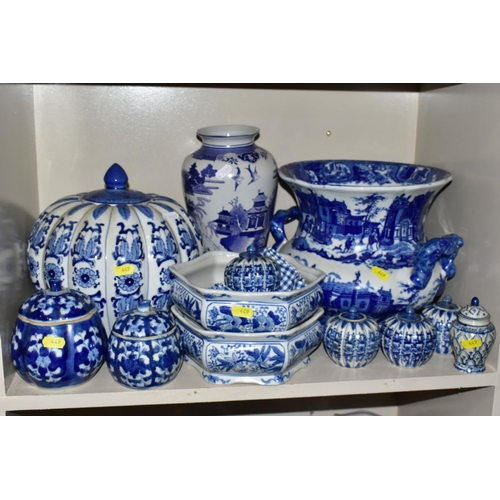 449 - A QUANTITY OF MODERN BLUE AND WHITE CERAMICS, including Oriental vases, stick stand, jars and covers... 