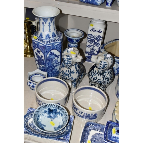 449 - A QUANTITY OF MODERN BLUE AND WHITE CERAMICS, including Oriental vases, stick stand, jars and covers... 