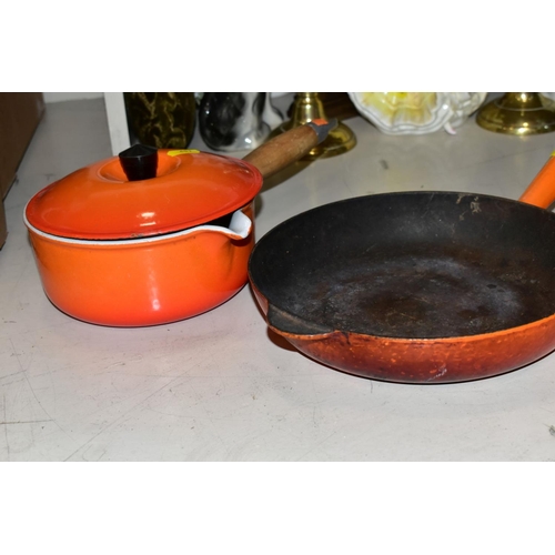 451 - TWO LE CREUSET ORANGE ENAMEL SAUCEPANS WITH POURING LIPS AND LIDS, 16cm and 18cm diameter, together ... 