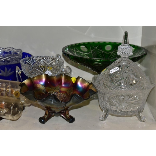 462 - A QUANTITY OF GLASSWARE, to include four decanters, a pair of candle holders with glass shades, jars... 