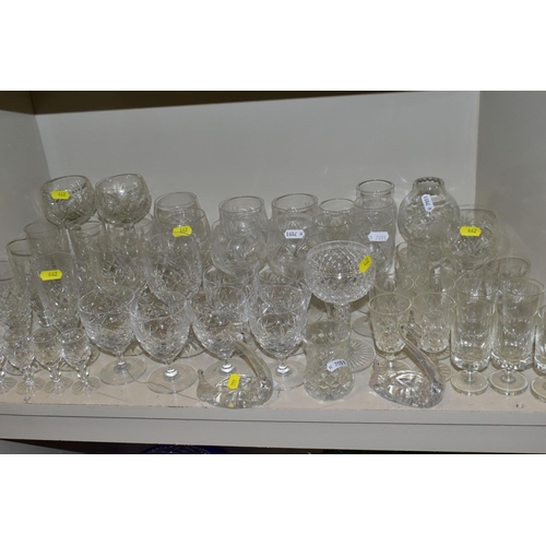 462 - A QUANTITY OF GLASSWARE, to include four decanters, a pair of candle holders with glass shades, jars... 