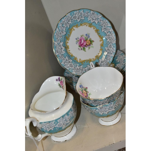 464 - A ROYAL ALBERT 'ENCHANTMENT' PATTERN TEA SET, comprising a milk jug, two bread and butter plates, tw... 