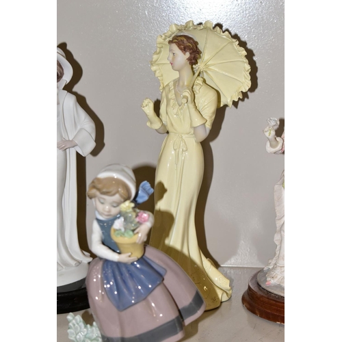 466 - TWO LLADRO FIGURES OF GIRLS AND OTHER LADY FIGURES, the Lladro comprising No 5223 'Spring is Here' (... 