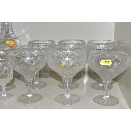 491 - A QUANTITY OF CUT AND PRESSED GLASS ETC, to include whisky, wine and tumbler glasses, bowls, comport... 