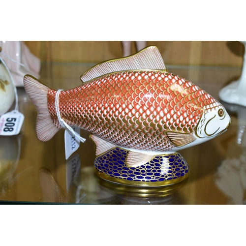 506 - A ROYAL CROWN DERBY PAPERWEIGHT, 'Golden Carp' with gold stopper