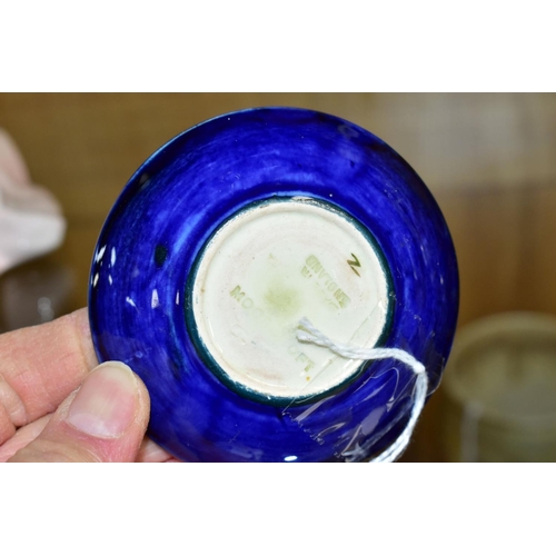 509 - A MOORCROFT POTTERY PIN DISH, 'Anemone' pattern on blue ground, impressed backstamp, diameter approx... 