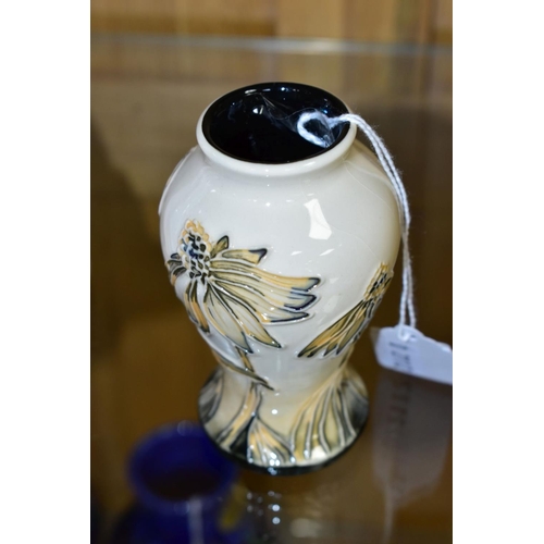 510 - A SMALL MODERN MOORCROFT POTTERY VASE, 'Cornflower' pattern, dated 2001, impressed backstamp, approx... 