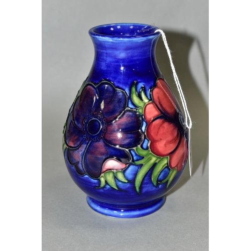 520 - A MOORCROFT POTTERY VASE, 'Anemone' pattern on blue ground, impressed backstamp and painted signatur... 