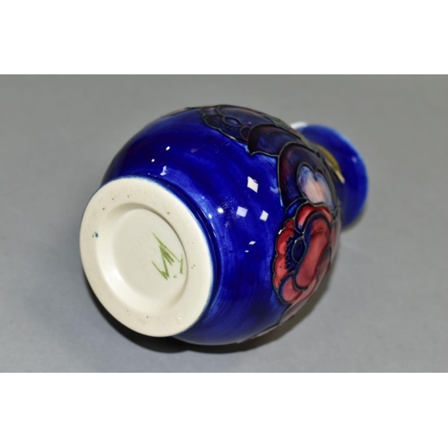 520 - A MOORCROFT POTTERY VASE, 'Anemone' pattern on blue ground, impressed backstamp and painted signatur... 