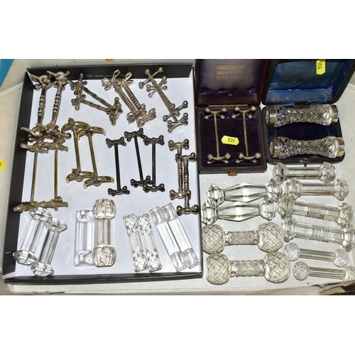 531 - A TRAY OF VARIOUS KNIFE RESTS, to include cased pair of silver rests, and a cased pair of silver rim... 