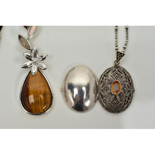 55 - TWO SILVER PENDANT NECKLACES, the first designed with a tiger eye and mother of pearl floral drop pe... 