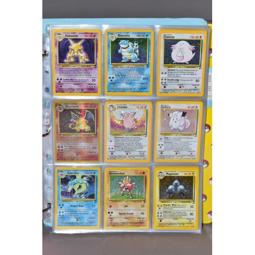 551 - A COMPLETE SET OF POKEMON BASE SET CARDS, and a complete set of Base set 2 cards except that Chariza... 