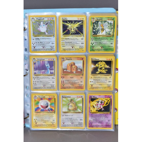 551 - A COMPLETE SET OF POKEMON BASE SET CARDS, and a complete set of Base set 2 cards except that Chariza... 