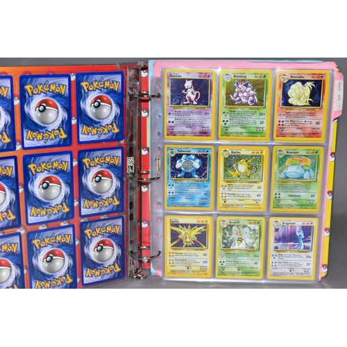 551 - A COMPLETE SET OF POKEMON BASE SET CARDS, and a complete set of Base set 2 cards except that Chariza... 