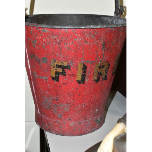 556 - A GALVANISED FIRE BUCKET, red painted exterior with gold shaded lettering, worn condition with paint... 