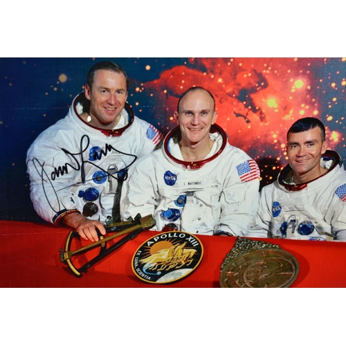 564 - NASA SPACE EXPLORATION INTEREST, a photograph of the crew of Apollo 13, signed by Captain Jim Lovell... 