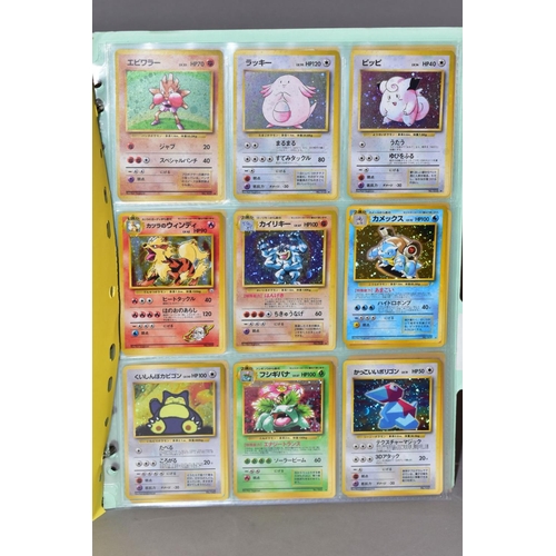 569 - A COMPLETE SET OF POKEMON TEAM ROCKET CARDS, including the 'Secret' Dark Raichu card (83/82), with a... 